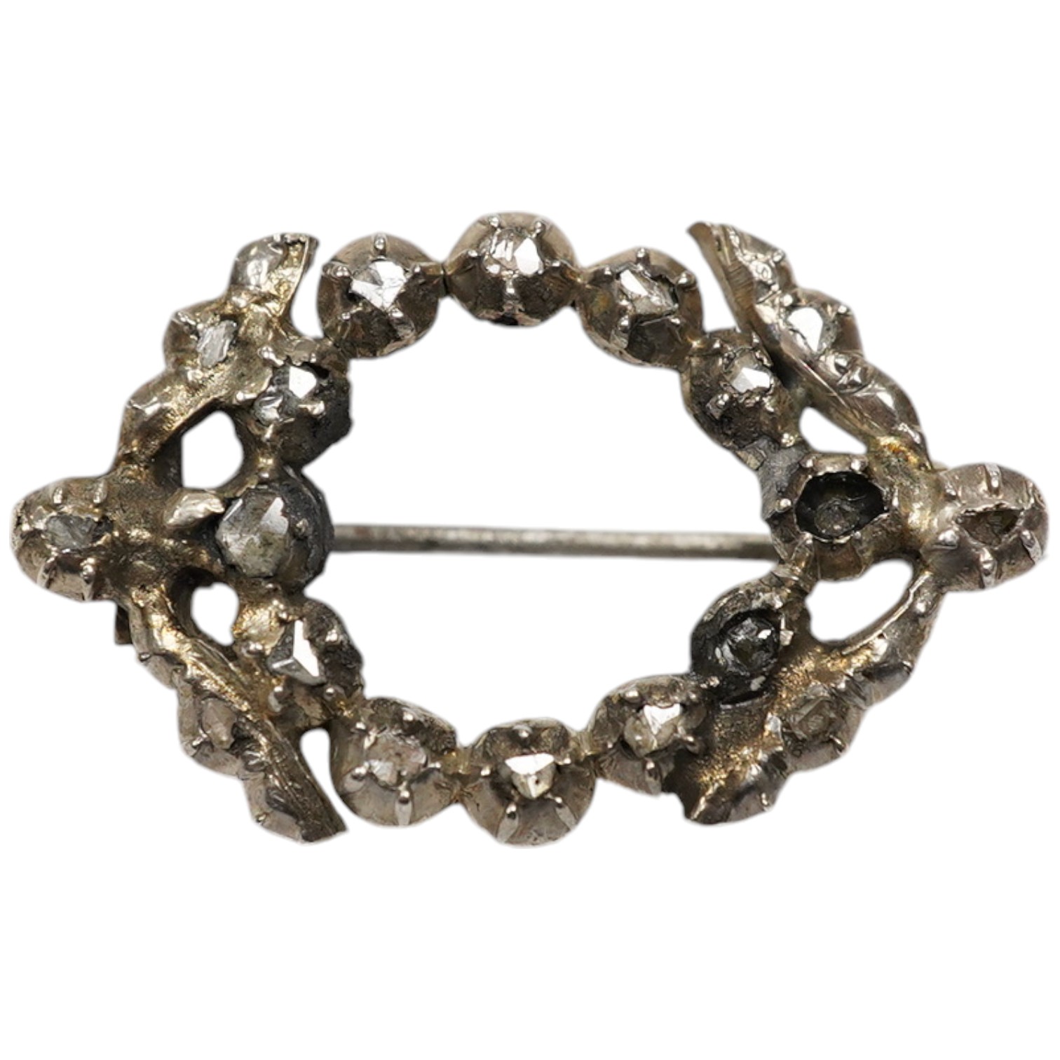 An antique white metal and rose cut diamond set open work brooch, 34mm, gross weight 5.5 grams. Condition - poor to fair